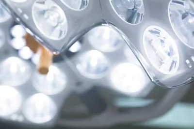 Spotlights above the table in an Hyrbid OR room
