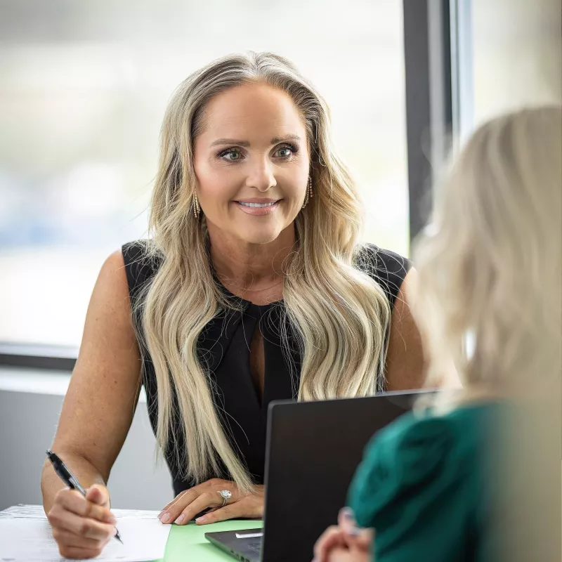 Health navigator talking with a patient about their healthcare plan moving forward.