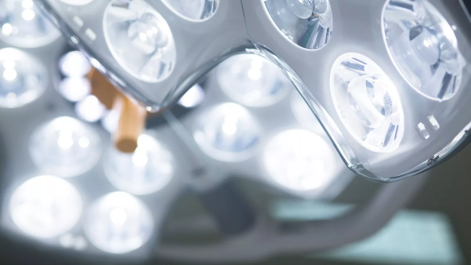 Spotlights above the table in an Hyrbid OR room